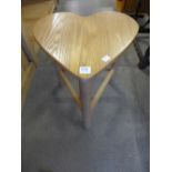 An elm heart shaped stool