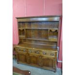 A George III style walnut dresser