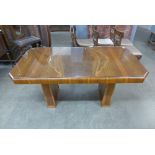 An Art Deco walnut octagonal dining table