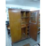 A mahogany fitted wardrobe