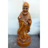 A Chinese carved rootwood figure of a sage