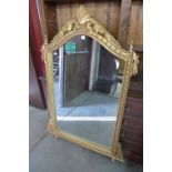 A reproduction French Louis XV style gilt mirror