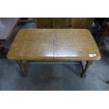 An oak metamorphic coffee table