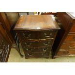 A mahogany serpentine chest of drawers