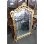 A reproduction French Louis XV style gilt mirror