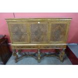 A Queen Anne style walnut and burr walnut cabinet on stand