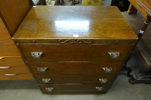 An oak chest of four drawers