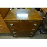 An oak chest of four drawers