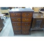 A Victorian mahogany double chest of drawers