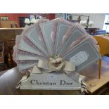 A Christian Dior display stand