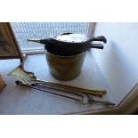 A brass coal scuttle,