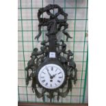 A 19th Century rococo revival cast bronze wall clock with white enamelled dial