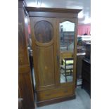 An Edward VII inlaid mahogany wardrobe