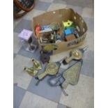 A box of assorted metalware including brass fire bellows, candlesticks, etc.