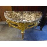 A reproduction French Louis XV style gilt console table