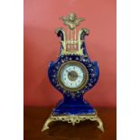 A French Sevres style cobalt blue porcelain and gilt metal lyre shaped timepiece