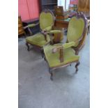 A pair of 19th Century French rococo revival mahogany upholstered fauteuils