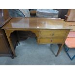 An Edward VII inlaid mahogany kneehole desk