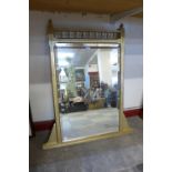 A gilt framed mirror