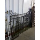 A pair of large wrought iron gates