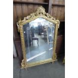 A reproduction French Louis XV style gilt mirror