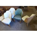 A set of four Art Deco walnut dining chairs