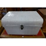 A white painted tin trunk