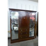 An Edward VII inlaid mahogany wardrobe