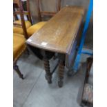 An oak barleytwist drop-leaf table