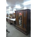 A 19th Century French carved oak three piece bedroom suite