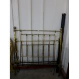 A brass double bed