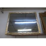 A gilt framed mirror