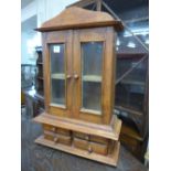 A hardwood table top cabinet