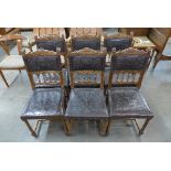 A set of six 19th Century French walnut and leather dining chairs