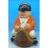 A lidded Huntsman Toby jug with fox handle,