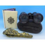 A brass nutcracker, a pair of theatre glasses, Jumelle De Paris, cased,