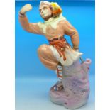 A pottery figure of a dressed dancing monkey, impressed oriental mark to the base,