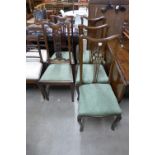 Five Edward VII walnut dining chairs