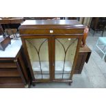 A mahogany two door bookcase