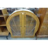 An Art Deco walnut display cabinet