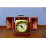A French Brevette bijou gilt metal travel alarm clock,