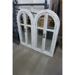 A pair of French style mirrors