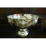 A white metal punch bowl