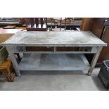 A pine and steel topped work bench