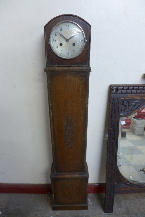 A Haller oak dwarf longcase clock