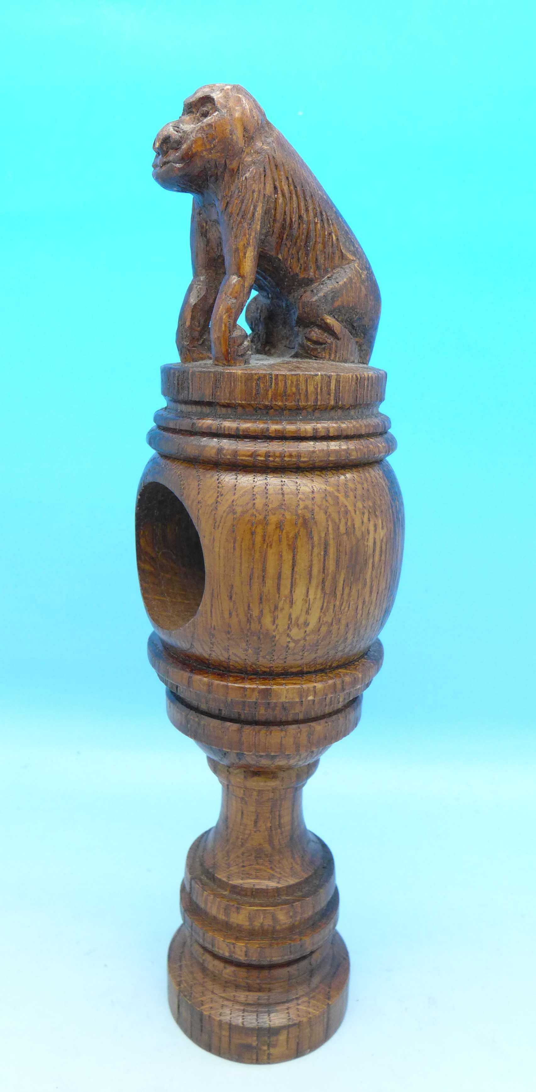 A carved oak screw nutcracker