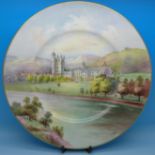 A Minton hand painted plate, signed R.