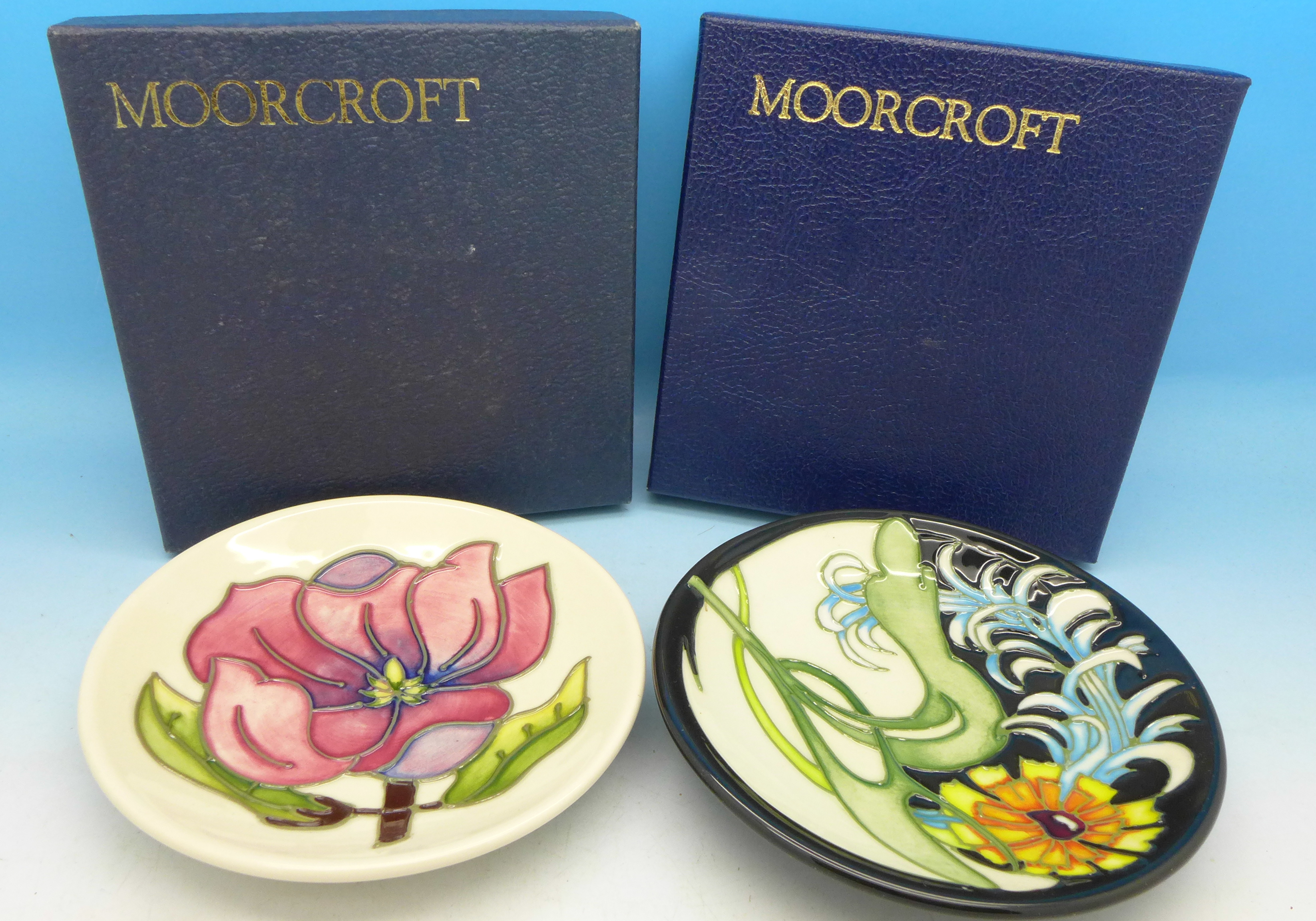 Two Moorcroft limited edition dishes, boxed,