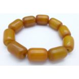 An amber coloured bead bracelet