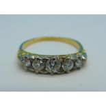 An 18ct gold and five stone old cut diamond ring, c.1900, approximately 0.